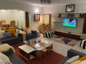 TV a/nebo společenská místnost v ubytování Anna's home stay