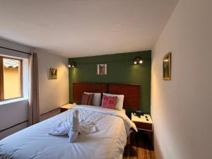 Letto o letti in una camera di Anido Hotel