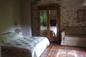 Postel nebo postele na pokoji v ubytování Nabat le Haut, chambre et table d'hotes