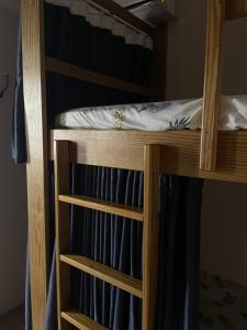 Voodi või voodid majutusasutuse 西嚕小屋 toas