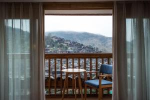 Nespecifikovaný výhled na hory nebo výhled na hory při pohledu z hotelu