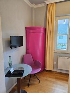TV a/nebo společenská místnost v ubytování Hotel Goldene Rose