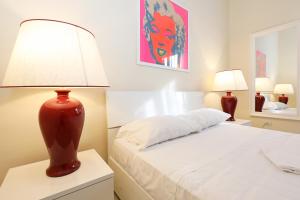 Voodi või voodid majutusasutuse LC GrandTour Libertà toas