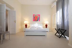 Voodi või voodid majutusasutuse LC GrandTour Libertà toas