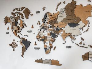a map of the world on a wall at Apartments On Zaliznychna 49 in Ivano-Frankivsʼk