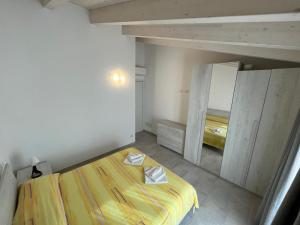 Postel nebo postele na pokoji v ubytování Luciano Home