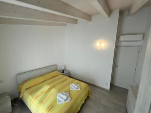 Postel nebo postele na pokoji v ubytování Luciano Home