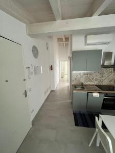 Kuchyň nebo kuchyňský kout v ubytování Luciano Home