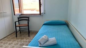 Postel nebo postele na pokoji v ubytování Casa Luigi