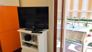 TV a/nebo společenská místnost v ubytování Casa Luigi