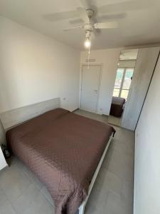 Postel nebo postele na pokoji v ubytování Luciano Home