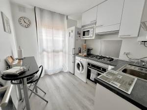 Kuchyňa alebo kuchynka v ubytovaní Apartamento Plaza España Las Rozas