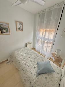 Posteľ alebo postele v izbe v ubytovaní Apartamento Plaza España Las Rozas