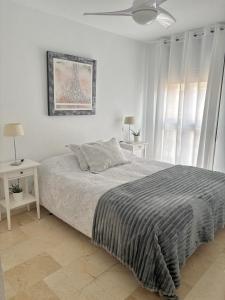 Posteľ alebo postele v izbe v ubytovaní Apartamento Plaza España Las Rozas