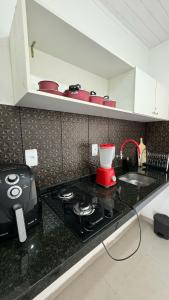 Kuchyň nebo kuchyňský kout v ubytování Flat na praia + 10 fotografií