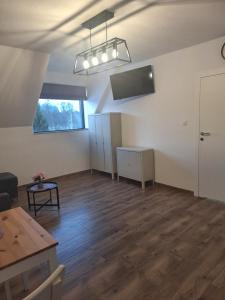 Telewizja i/lub zestaw kina domowego w obiekcie Siedlisko Bogdanka