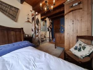 Postel nebo postele na pokoji v ubytování Maison d'hôtes Les Gravets