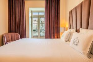 Cama ou camas em um quarto em Hotel República Boutique Hotel