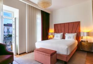 Cama ou camas em um quarto em Hotel República Boutique Hotel