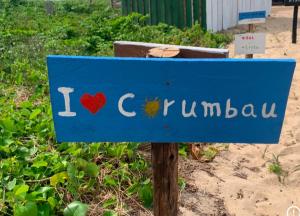 a blue sign that says i love uimbabwe at Raizes da Terra - Ponta do Corumbau in Corumbau