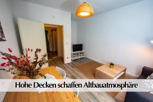 Posezení v ubytování 3R Altbau-Apartment mit 2SZ, Smart-TV, Ruhige zentrale Lage