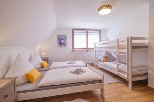 Postel nebo postele na pokoji v ubytování Eifelhaus Abel