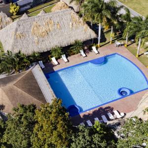 Bazén v ubytování Hotel Las Hamacas nebo v jeho okolí