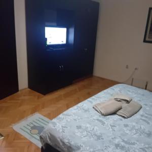 Postel nebo postele na pokoji v ubytování Apartment Viktor 2 stan na dan