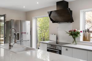 Η κουζίνα ή μικρή κουζίνα στο Evergreen - Eco Home +21 φωτογραφίες
