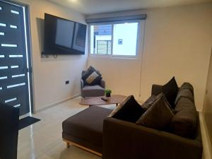 TV a/nebo společenská místnost v ubytování Departamento Amplio y Comodo