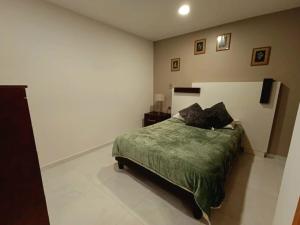 Postel nebo postele na pokoji v ubytování Departamento Amplio y Comodo