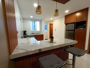 Kuchyň nebo kuchyňský kout v ubytování Departamento Amplio y Comodo