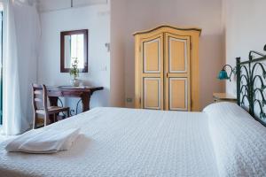 Postel nebo postele na pokoji v ubytování B&B Orto Paradiso