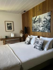 Postel nebo postele na pokoji v ubytování Tourterelle Garden Room