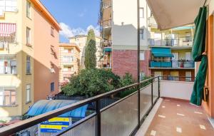 a balcony with a view of a city at 1 Bedroom Beautiful Apartment In Recco in Recco +18 photos