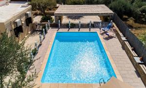 an overhead view of a swimming pool in a house at Cretan Kera in Kissamos