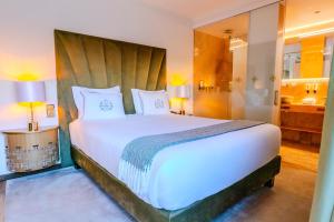 Cama ou camas em um quarto em Hotel República Boutique Hotel