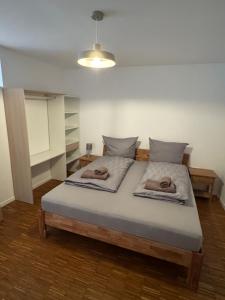 Postel nebo postele na pokoji v ubytování "Cooles Ferienhaus!" - im Coburger Wonderland - Ihr Zuhause auf Zeit!