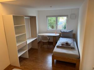 Postel nebo postele na pokoji v ubytování "Cooles Ferienhaus!" - im Coburger Wonderland - Ihr Zuhause auf Zeit! + 35 fotografií