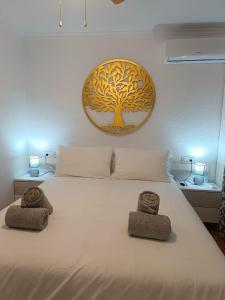 Posteľ alebo postele v izbe v ubytovaní Vera Natura Apartamento Anima