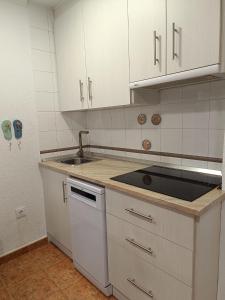 Kuchyňa alebo kuchynka v ubytovaní Vera Natura Apartamento Anima
