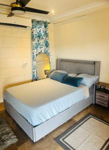 Katil atau katil-katil dalam bilik di Island Breeze Apartment +42 gambar