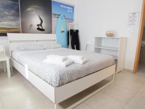 Postel nebo postele na pokoji v ubytování Zambeachouse - Hostel Paradise
