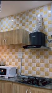 Kuchyň nebo kuchyňský kout v ubytování Sea-Love Apartment In Ado-Ekiti