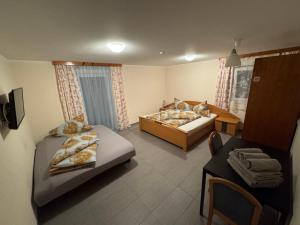 Postel nebo postele na pokoji v ubytování Haus Anna