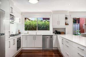 Η κουζίνα ή μικρή κουζίνα στο Common Occurrence - Perfectly Positioned in Mile End