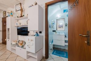 Kuchyň nebo kuchyňský kout v ubytování Il Posto Nascosto + 37 fotografií