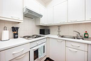 Kuchyň nebo kuchyňský kout v ubytování Charming 1 Bedroom By London Bridge