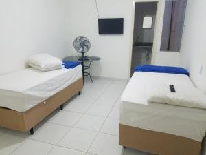 Postel nebo postele na pokoji v ubytování Kowarick