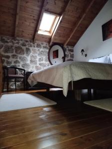 Postel nebo postele na pokoji v ubytování Xenonas Epavlis